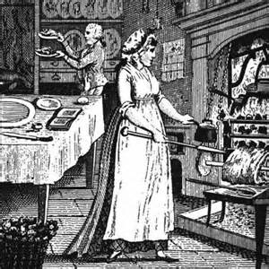 Cook in  a Georgian household, turning  a spit for a roast and dealing with a kettle on an open fire. In the background a footman carries two dishes, heading to the dining room.